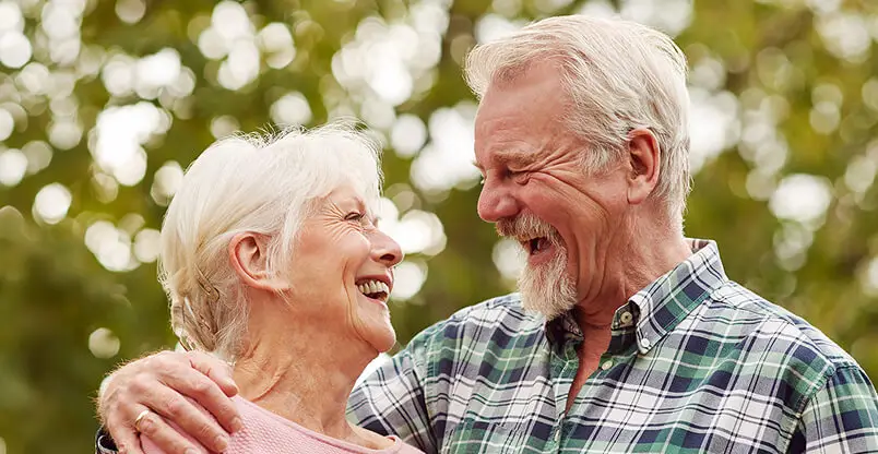 Senior Couple Smiling Outdoors
